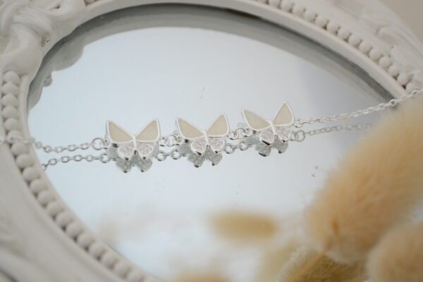 Pulsera EVELYN: Trama Espejito con Centro Tres Mariposas con Micro Cúbics / Nácar